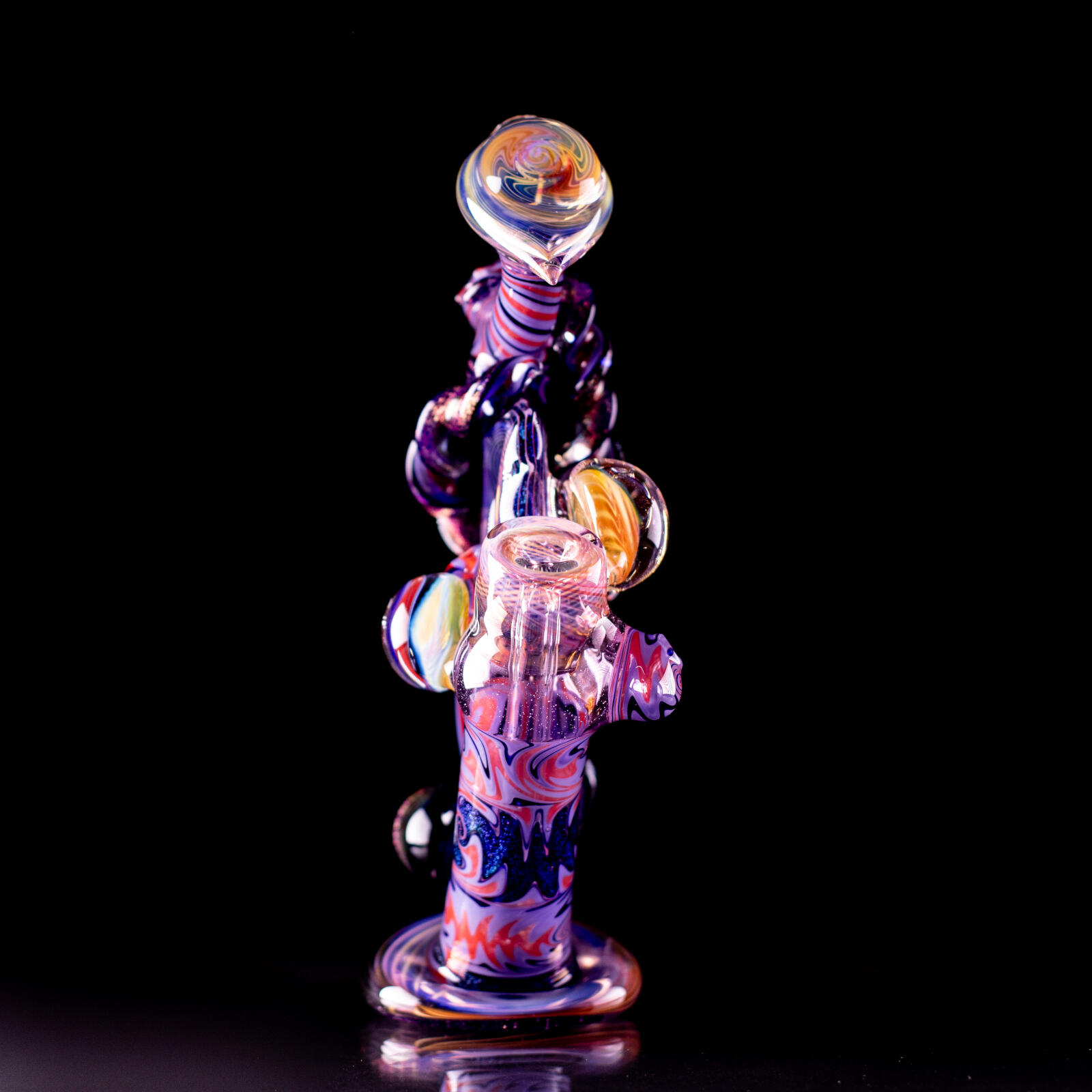 Bubbler with discs and swirls